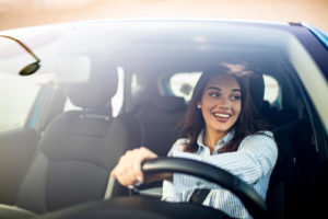 female driver smiling